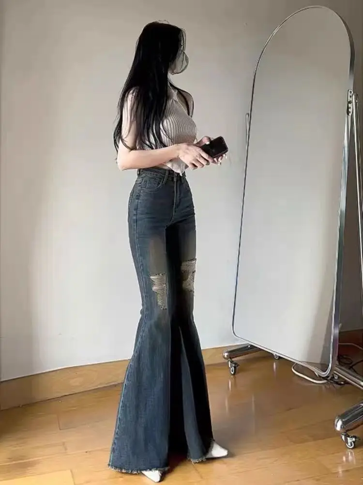 

Sexy Women Distressed Denim Slight Flare Pants High Rise Retro Look 2026 Spring Collection American Chic
