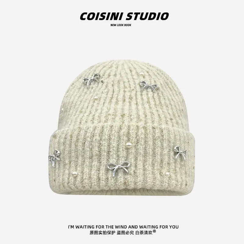 Koreanische Schleifenkappe mit Perlen für Damen, Herbst und Winter, einfache, warme, große Ohrenschutz-Strickmütze. – Detail 3