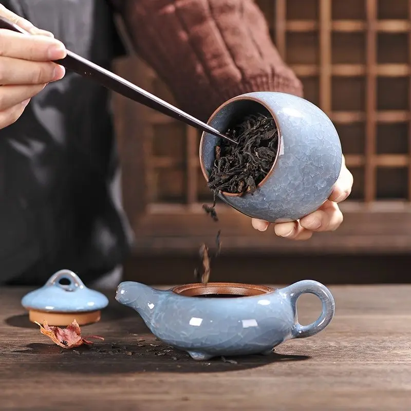 

Mini small purple sand tea jar ice cracked glaze ceramic portable pu'er sealed tea box
