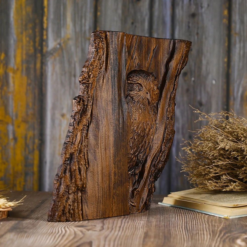 Hand-carved owls in trunk wall art, wooden animal carvings in a rustic natural style