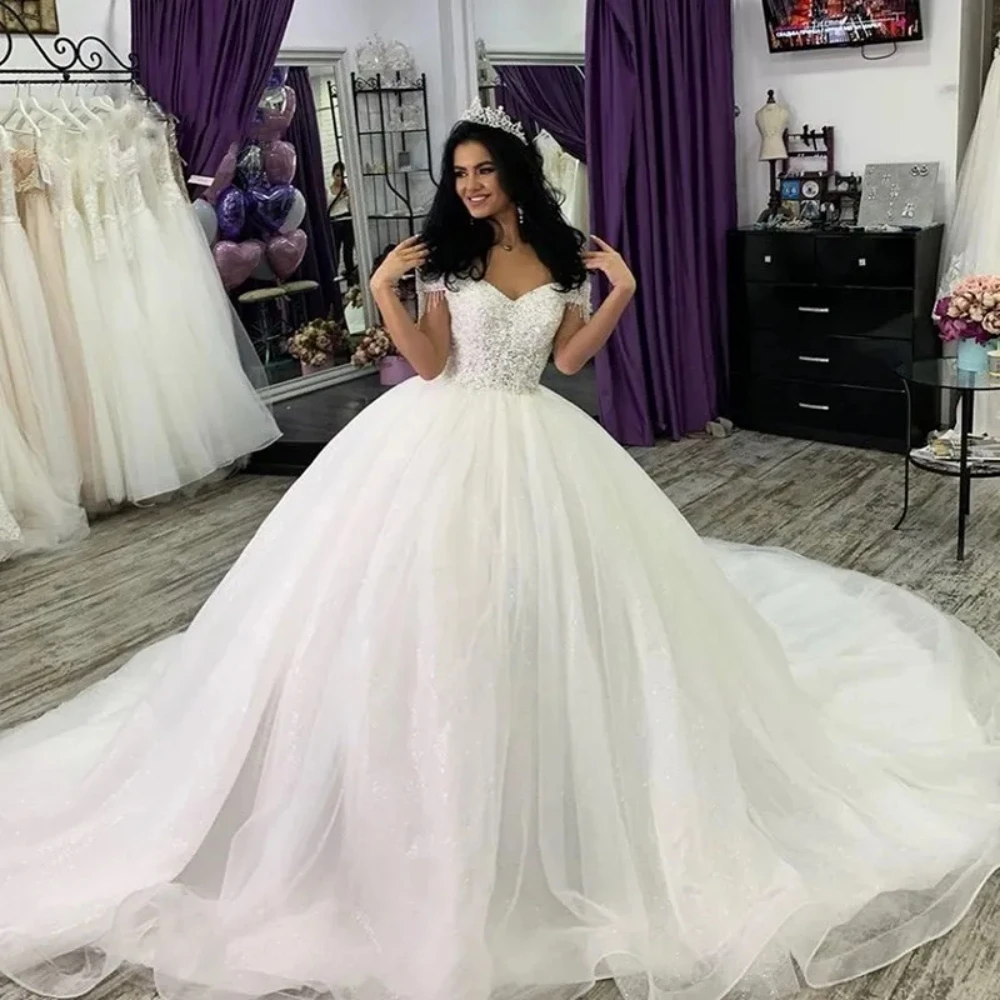 

Stunning Crystals Beaded Ball Gown Wedding Dresses Sexy Off Shoulder Cap Sleeve Bridal Gown Puffy Corset Back Vestidos De Novia