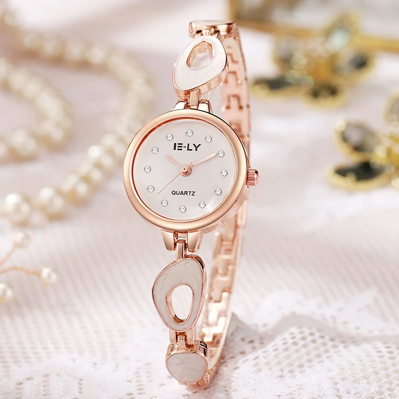 Nova pulseira relógio feminino luz luxo nicho temperamento elegante sênior senso de esqueleto irregular relógio de pulso