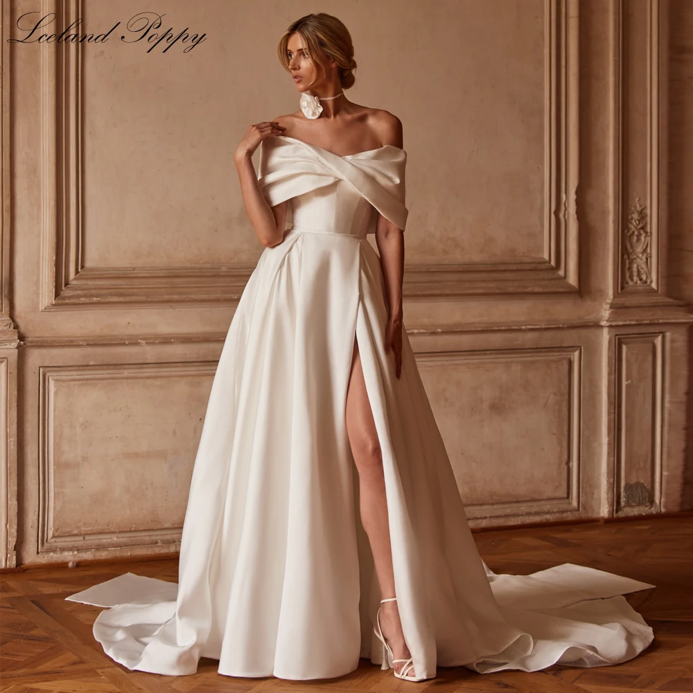 

Lceland Poppy A Line Boat Neck Satin Wedding Dresses 2024 Short Sleeves High Slit Bridal Gowns with Chapel Train