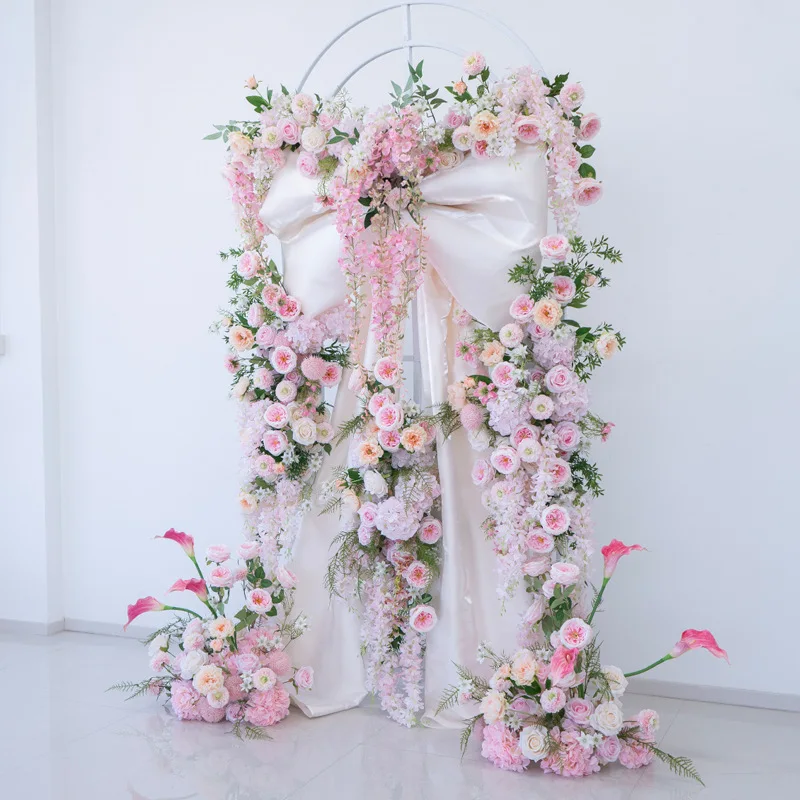 Fantasy pink and white simulated flower arch, wedding bow ceremony set, decorative flower clock in shopping mall