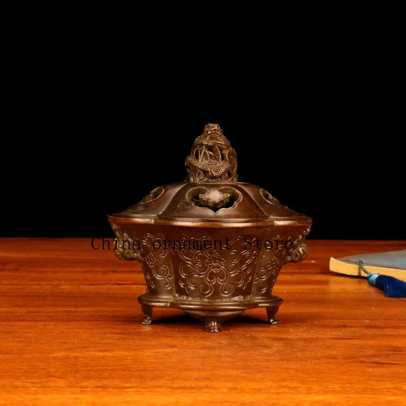 Antique-style bronze incense burner with a dragon lid and lion ears, an antique decorative piece, a miscellaneous antique, an in