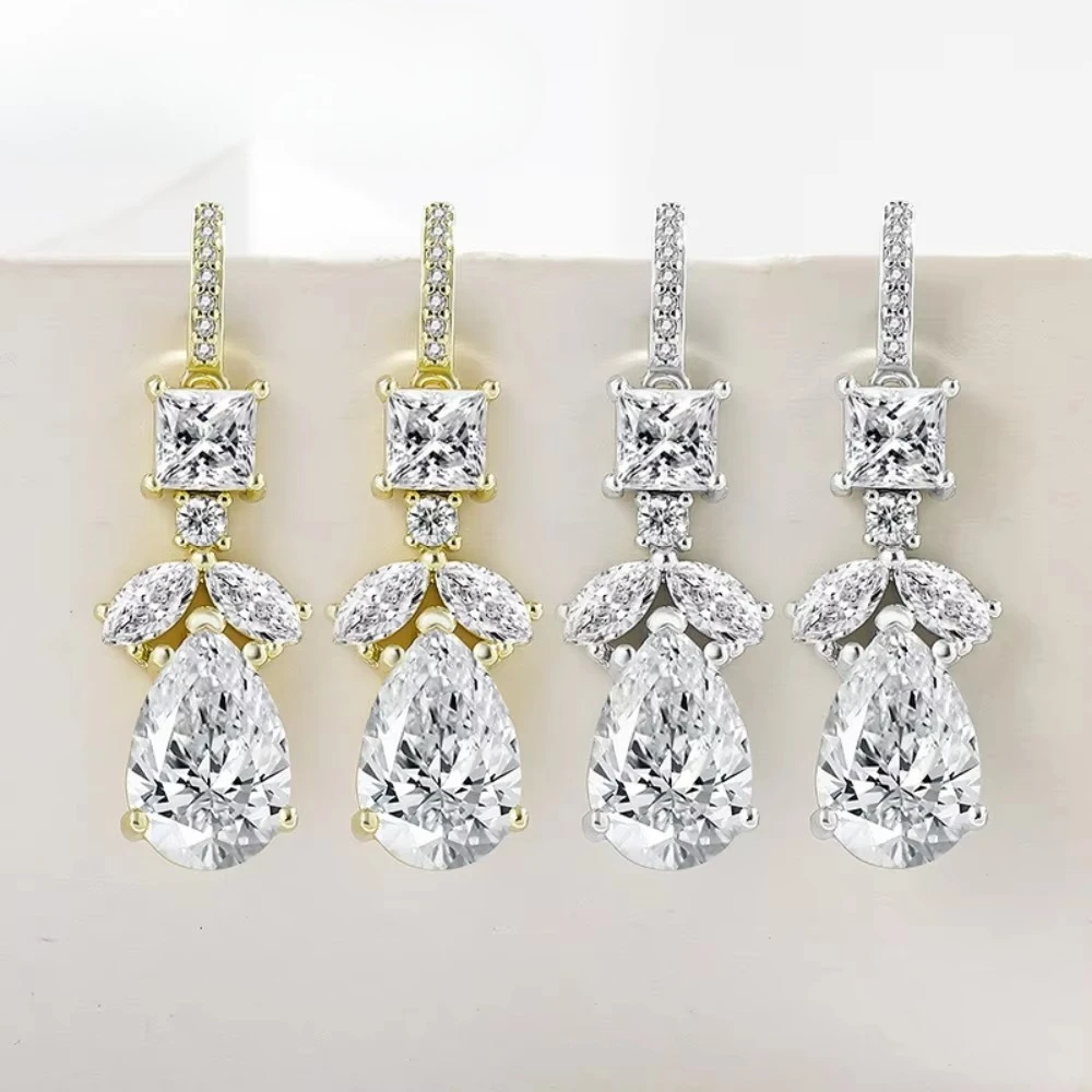 Luxury semi-gold 925 sterling silver crystal earrings, plated with 18K gold and set with multiple diamonds as the ear pendants.