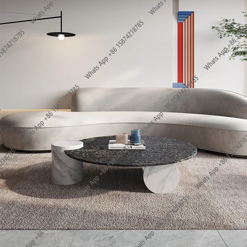 Light luxury wabi-**** wind post-modern water ripple glass round coffee table designer model house rock slab coffee table