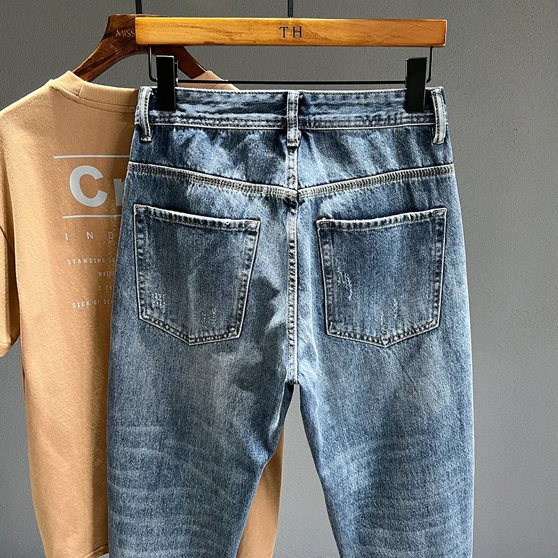 New Frayed Jeans Men Baggy Personality Tapered Casual Pants Streetwear Hip Hop Vintage Blue Denim Trousers Male Trendy Brand