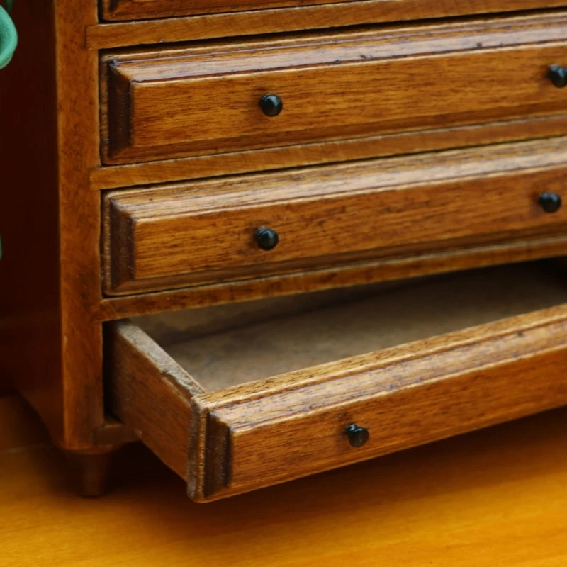 Mini gabinete detallado 5 cajones con acabado en castaño, construcción robusta, para organización casas 15UB