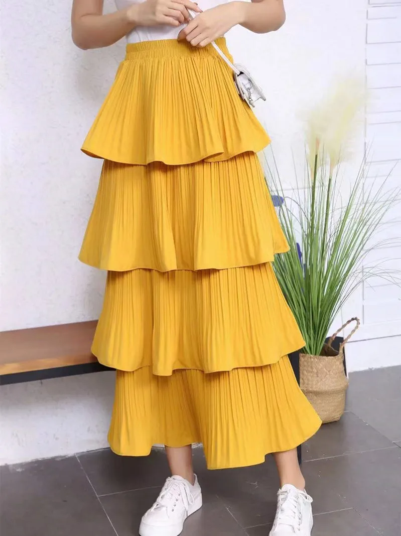 Gonna a pieghe con orecchie in legno Vita elastica Torta Sle f-lunghezza Streetwear da donna Gonna a vita media con giuntura in puro colore