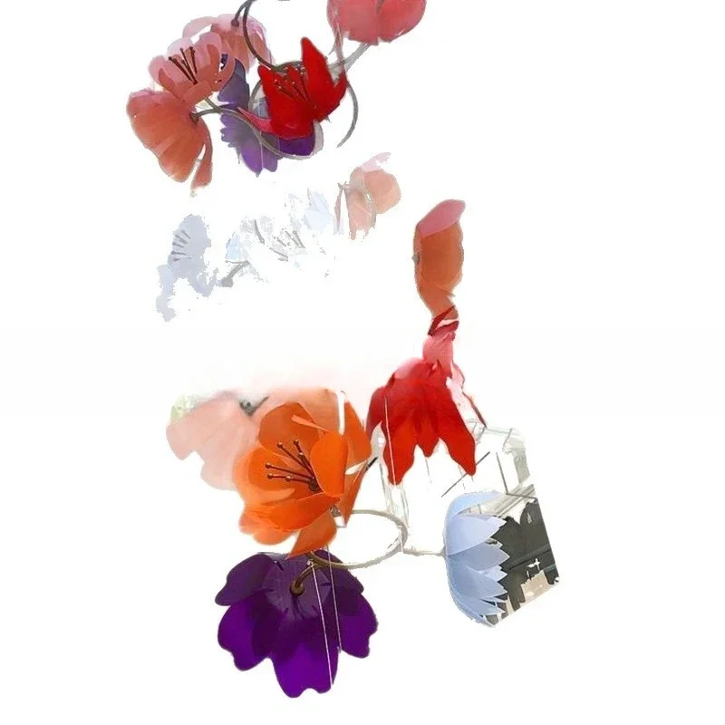 Shopping mall festival atrium, cartoon textile fabric simulation flowers, hot bending acrylic flower window layout