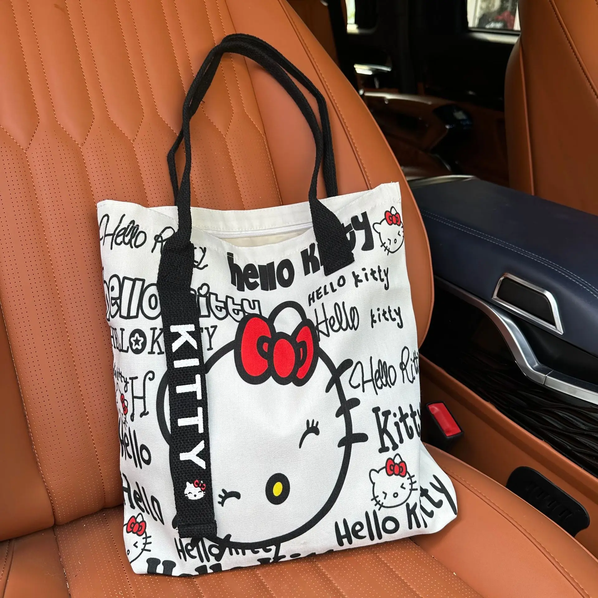 

2025 Spring New Hello Kitty Canvas Tote Bag Women Large Capacity Casual Shoulder Bag Fashion