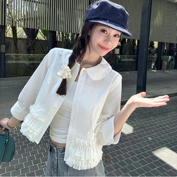 

2025 New Wrinkled Ruffle Edge Doll Collar Shirt for Women's Korean Style Seven Quarter Sleeved White Short Shirts