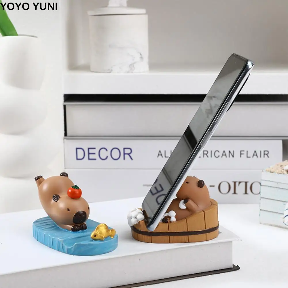 

Фигурка Модель Капибара Держатель для телефона Поддержка животного Капибара Подставка для мобильного телефона Настольный декор Мультфильм Капибара Кронштейн для мобильного телефона