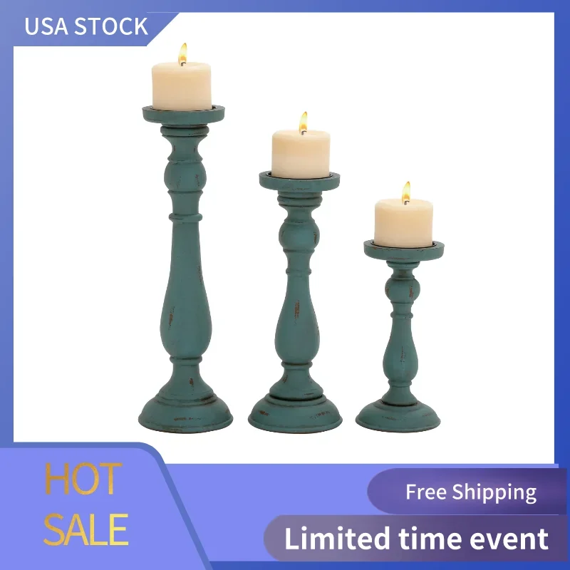 

DecMode Traditional Wood Blue Pillar Candle Holders Set of 3 19", 15", 11" H with a Round Candle Plate and Bell Shaped Base