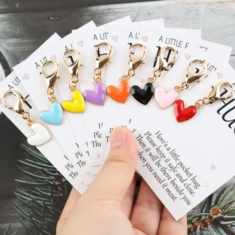 Juego de 8 tarjetas de felicitación emocionales “Abrazo de bolsillo” con bolsillo y un divertido llavero con forma de corazón. Se puede utilizar para decorar bolsos.