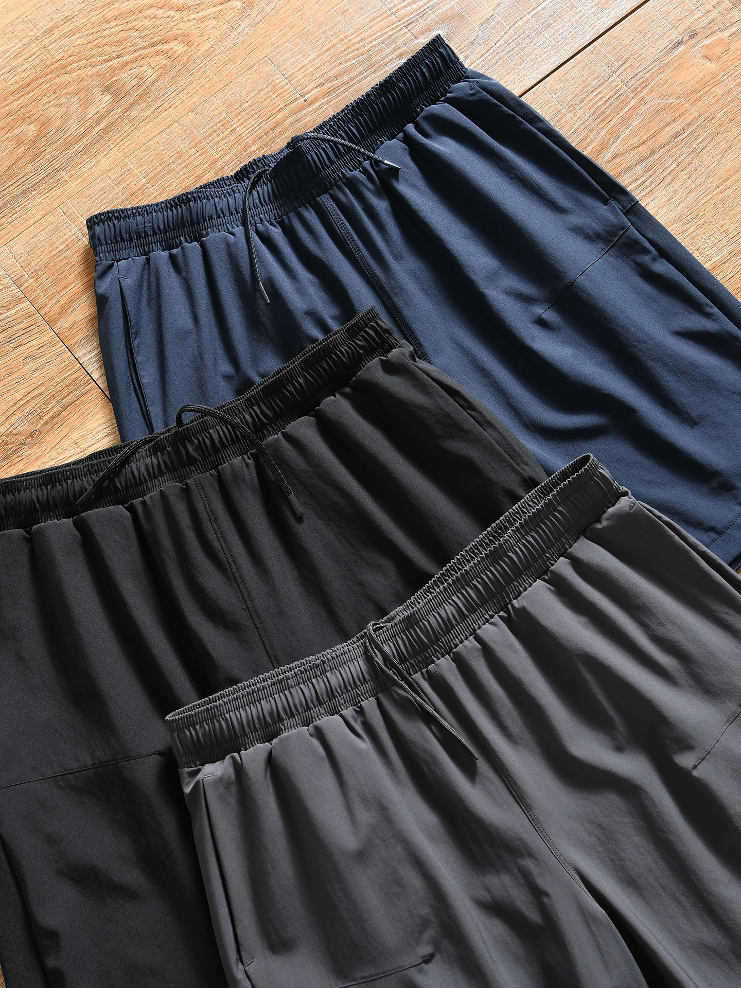 Quick Dry Laser Perforated Breathable Shorts for Men Outdoor Sports Running Summer Loose Fit Polyester Fiber Micro Elastic