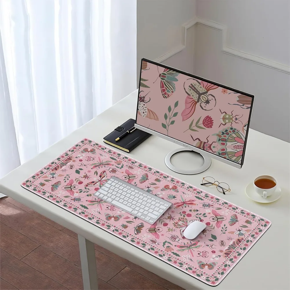 The pink mouse pad with rubber anti-slip and washable quality is a high-quality computer game accessory suitable for gamers