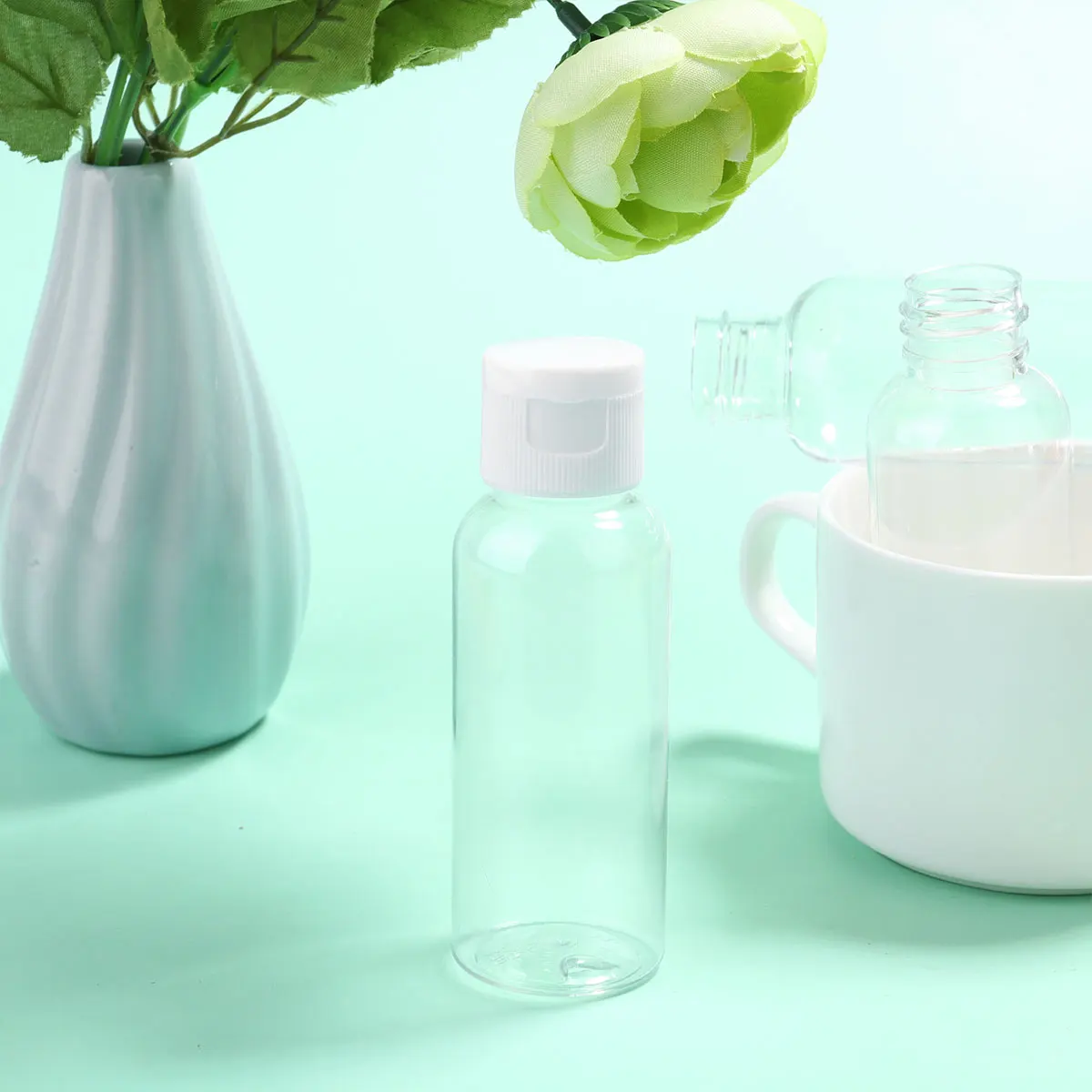 

20pcs Travel Bottles Small Empty Subpackaging Plastic Lotion Transparent Portable Ideal for Essential Oils Shower Gel