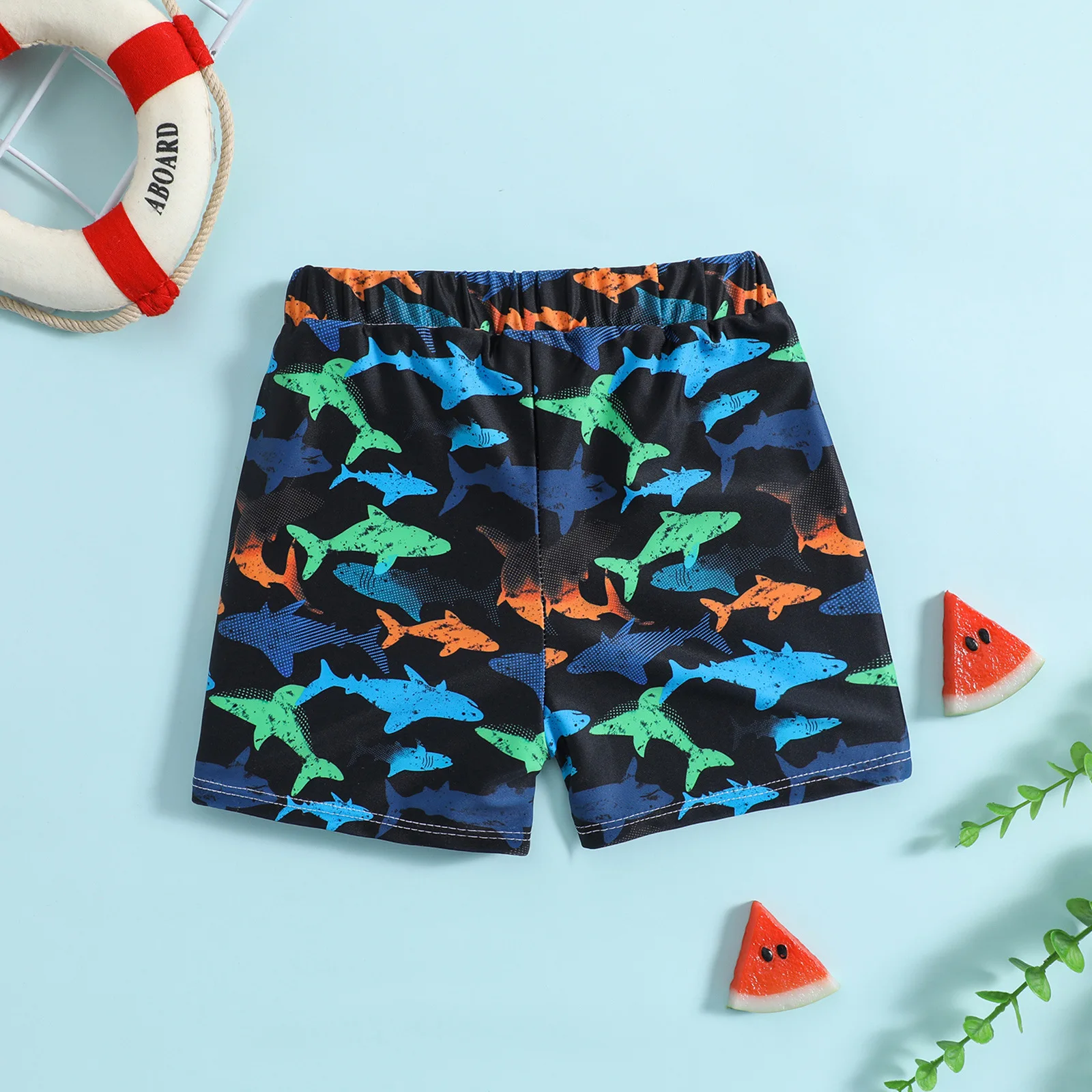 Baby swim trunks printed with colorful shark pattern suitable for seaside vacation and pool water play