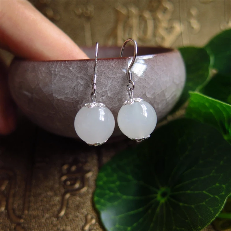 

Белые круглые бусины, нефрит, украшения категории А, серьги Хотан.