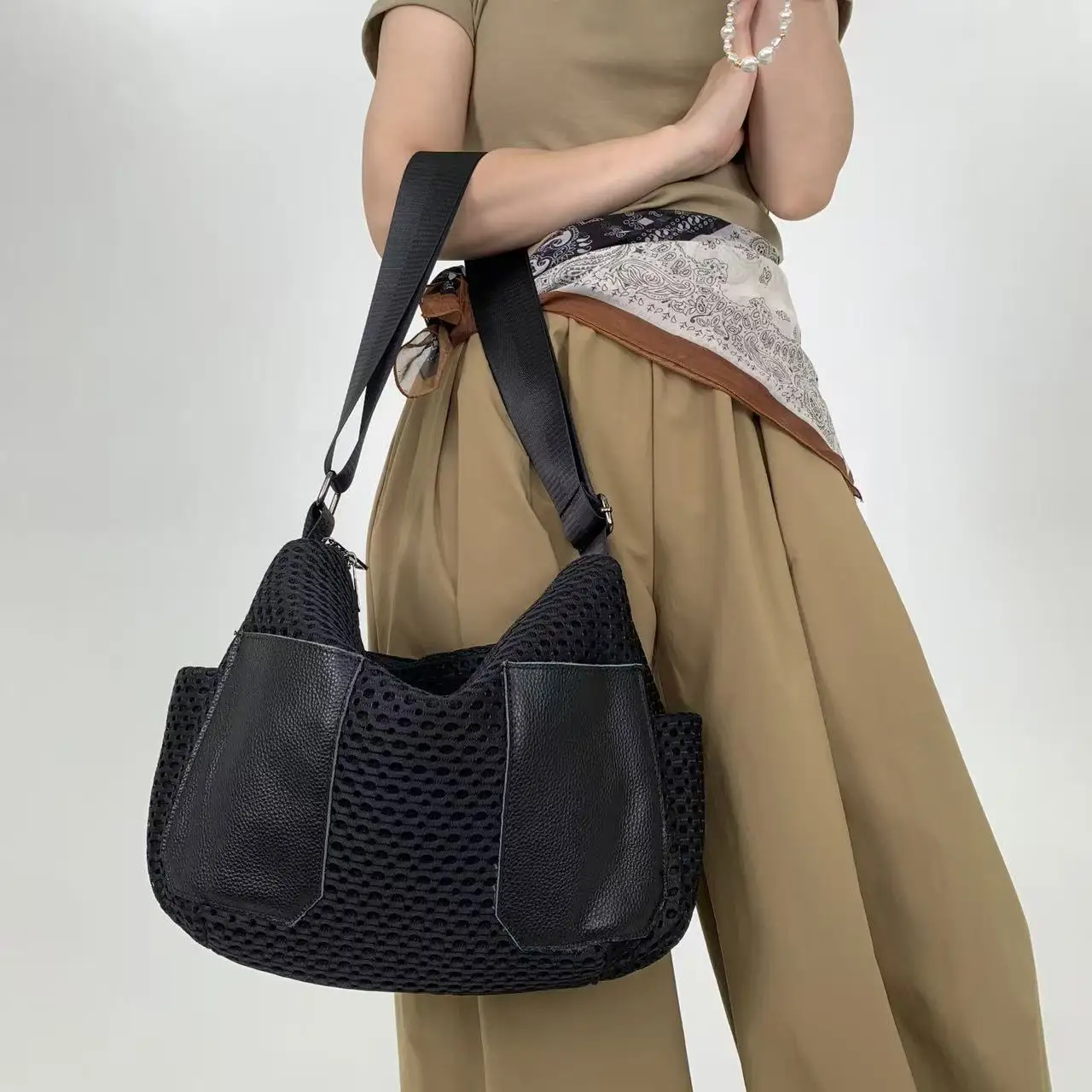 

Ladies' fashionable mesh spliced nylon crossbody bag, niche multi pocket knitted single shoulder handbag