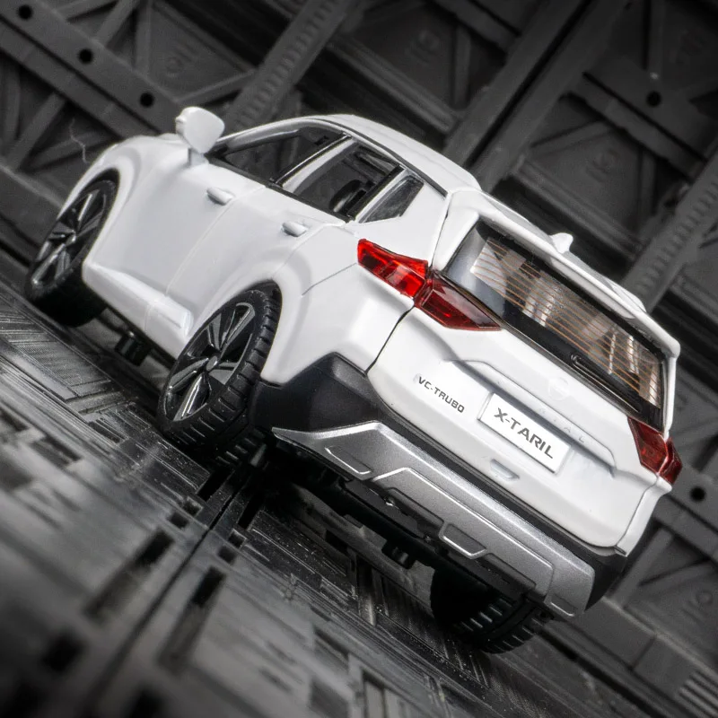 Modelo de vehículo todoterreno de aleación Nissan x-trail 1:32, puerta de juguete para niño extraíble y el maletero del capó se puede abrir como regalo