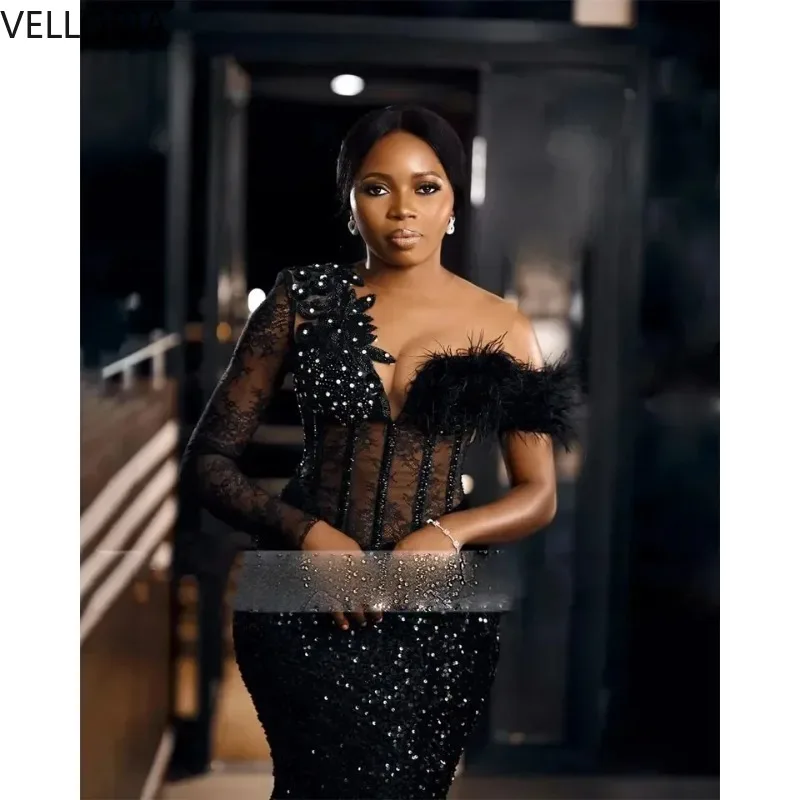 

Black Mermaid Evening Gowns Beaded Corset Long Sleeve Big Feather Prom Dresses Women Pageant Wedding Party Vestidos Customized