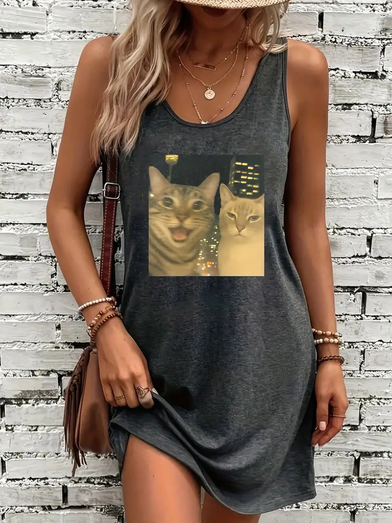 Women's round-neck sleeveless dress, featuring a contrast cute print of two cats against the city night scene.