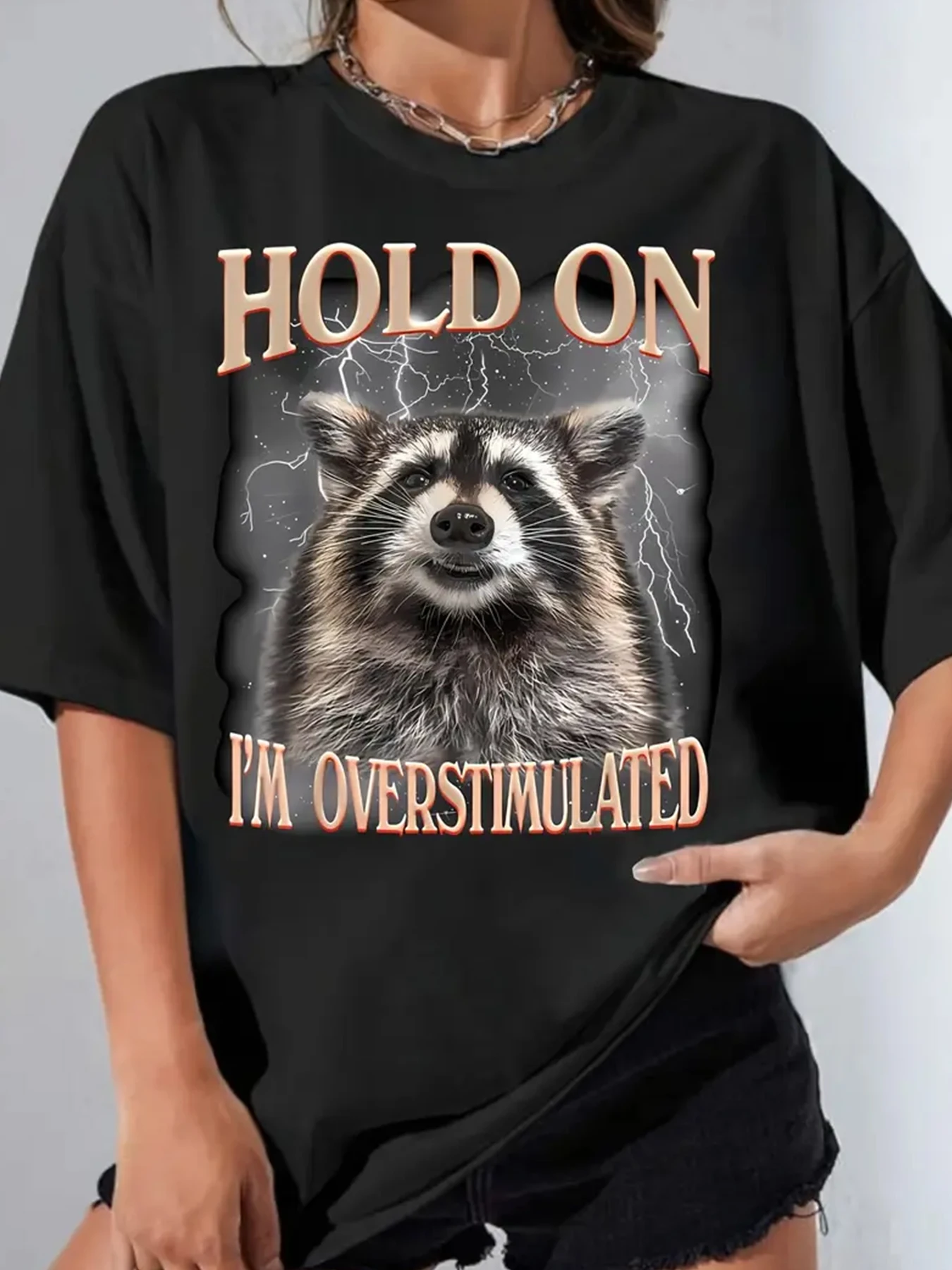 

Hold On I'm Overstimulated Raccoon Pattern Large Women T-shirt - Casual Summer Short Sleeve Black Lightning Letter Print