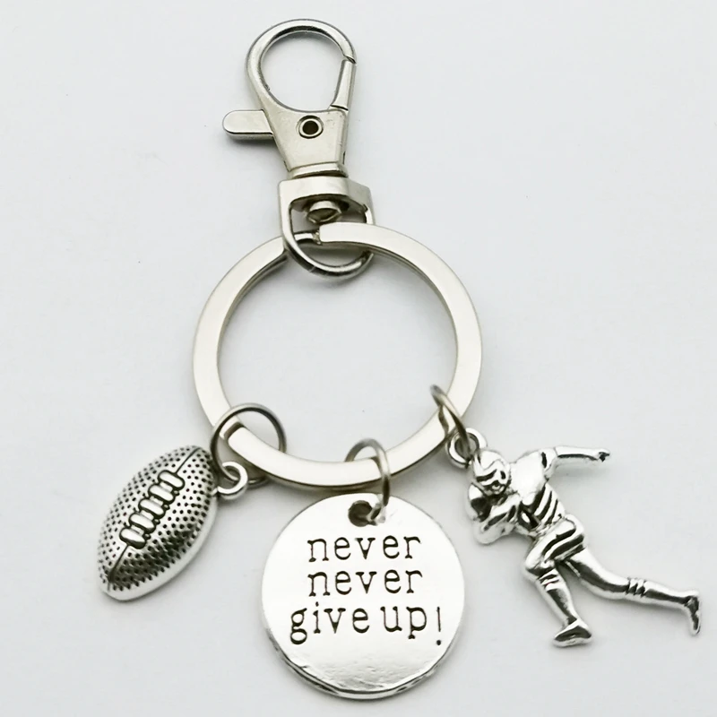 

Женское кольцо для регби с надписью «Never Give Up»