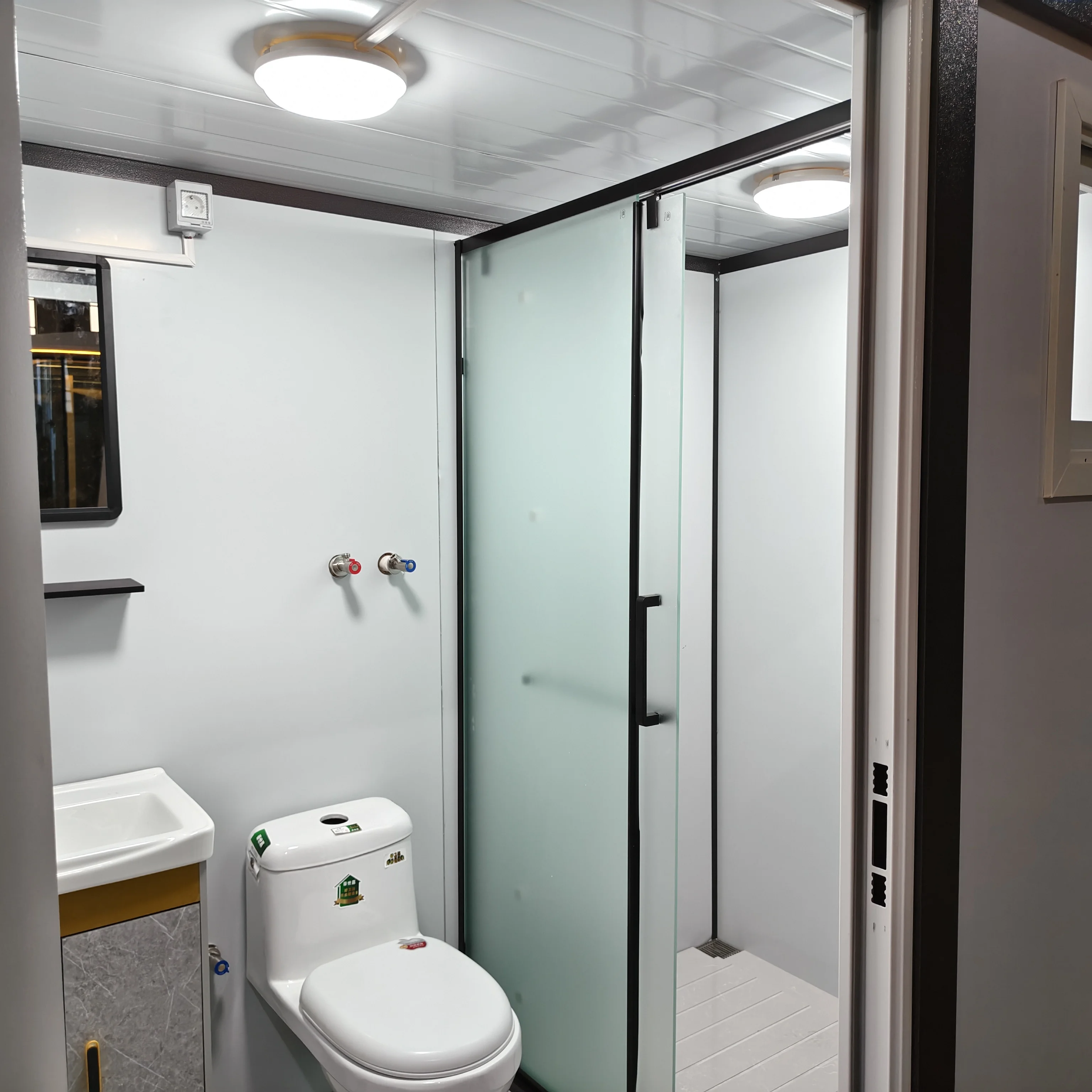 2026 Modern Prefab Toilet Cabin Steel Frame Bathroom with Shower Area and Ceramic Sink for Glamping Site and Public Parkpromote
