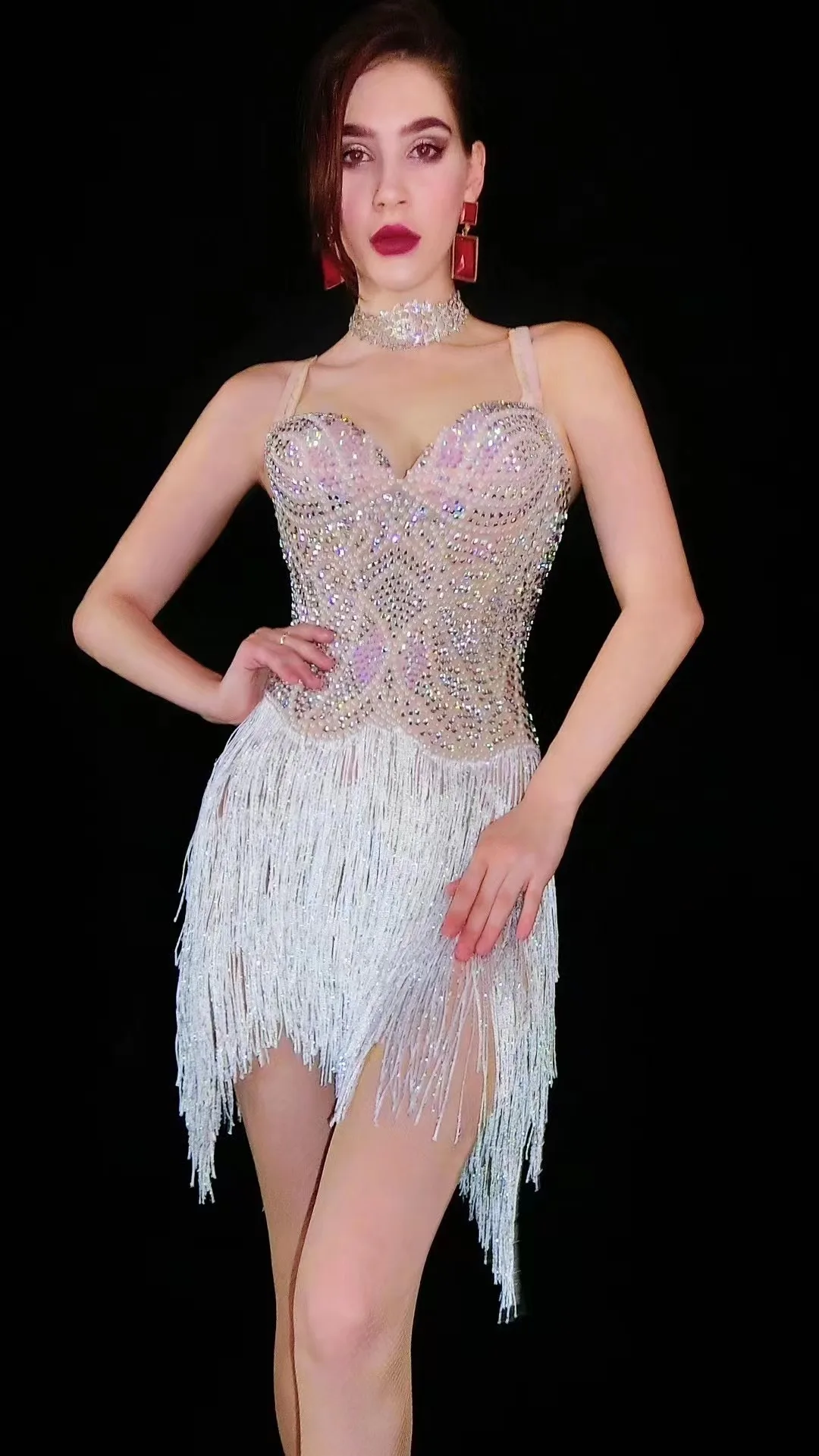 

Performance clothes, nightclubs, bars, women, full diamond tassels, cha cha straps, and a dance team of conjoined singers