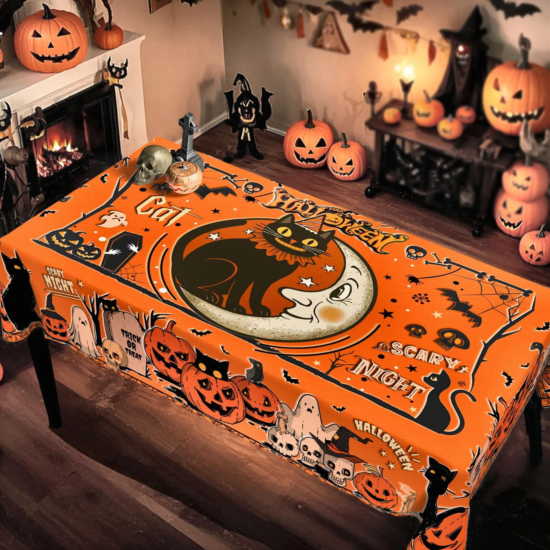 Happy Halloween tablecloth, featuring designs of black cats, full moons, pumpkins, ghosts, skulls and crows.