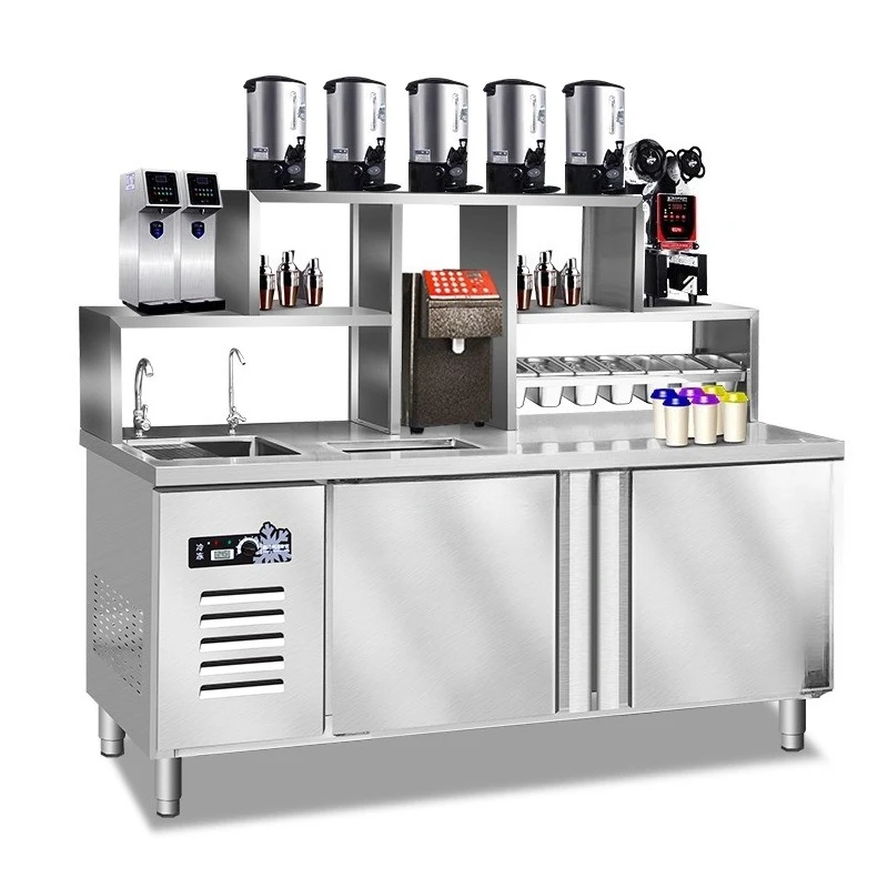 A full set of commercial stainless steel water bar consoles, refrigerated workbenches, beverage store shelves