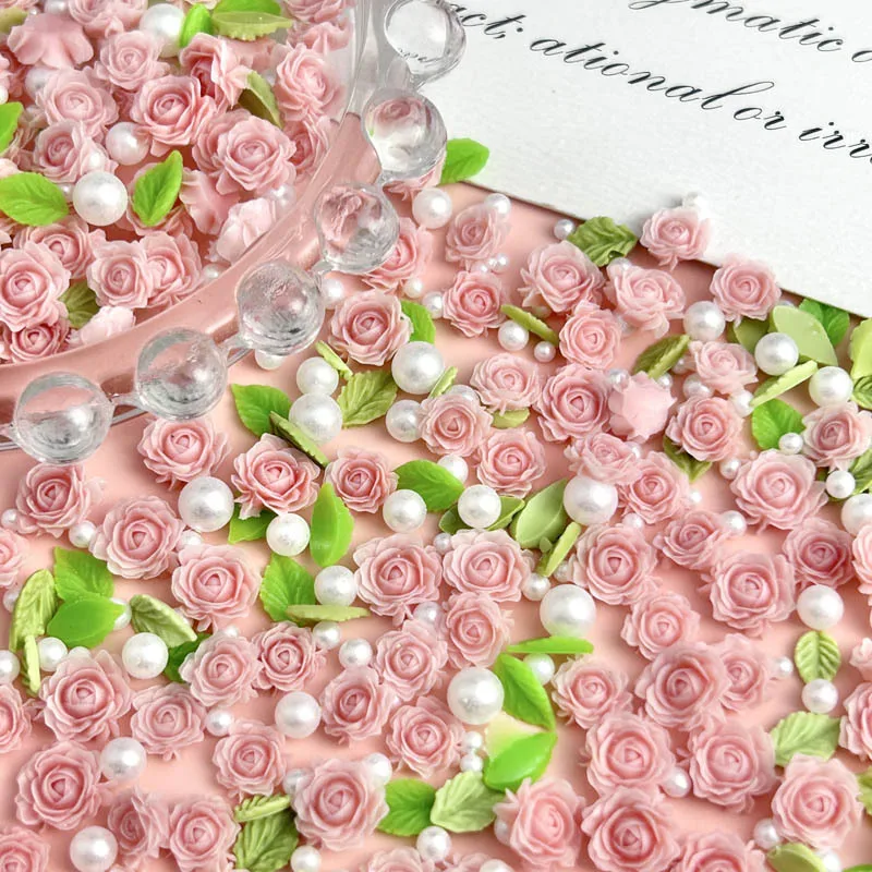 ดอกไม้เรซิ่นผสมแบบสุ่มดอกกุหลาบสีชมพูเสน่ห์ของเล็บด้วยใบไข่มุกสำหรับตกแต่งศิลปะเล็บงานฝีมือเครื่องประดับ DIY 50ชิ้น