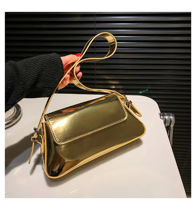 Bolso de mano con diseño láser para mujer, bandolera plateada de lujo, elegante, para fiesta, 2023