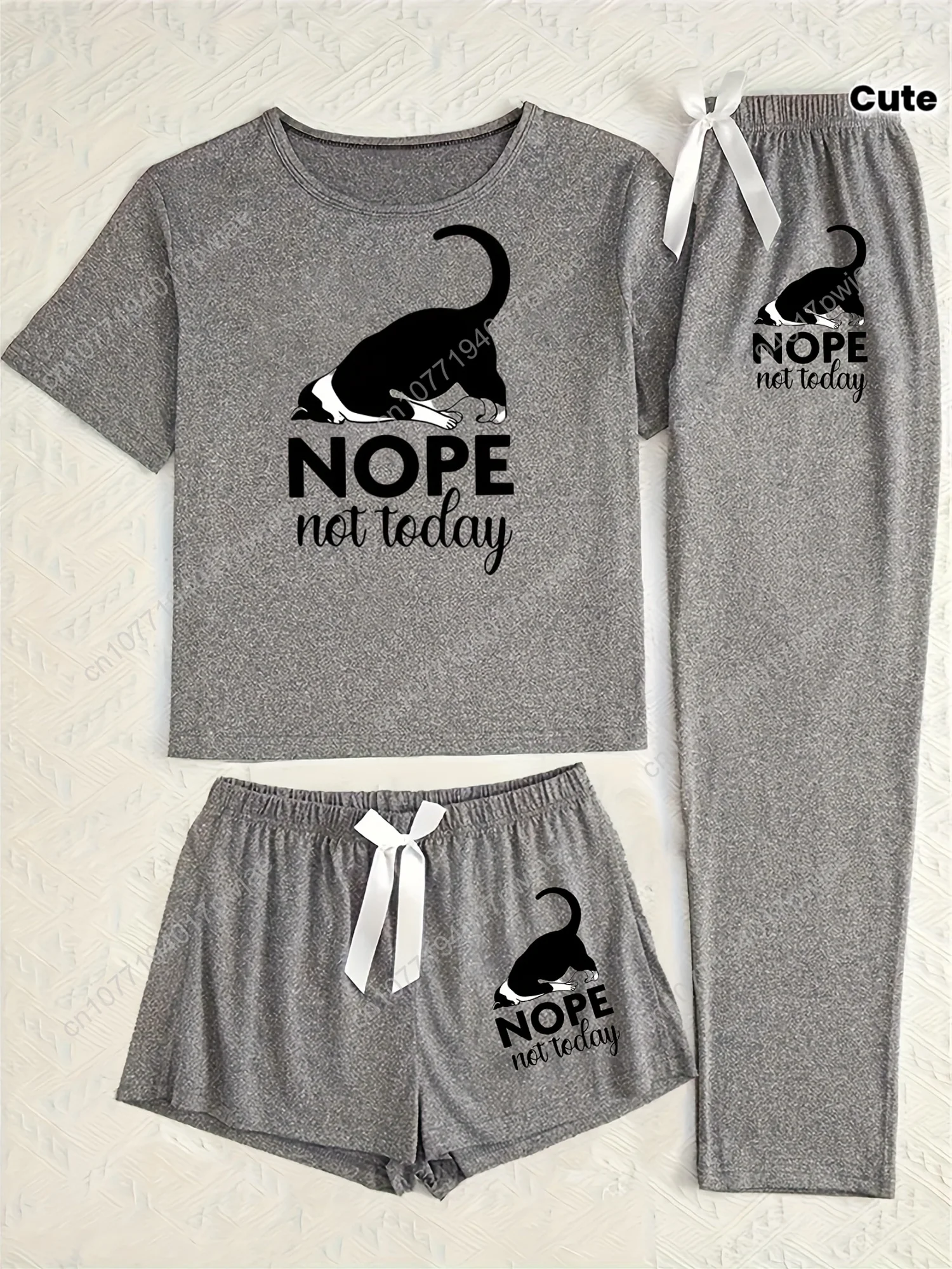 

A Cozy Three-Piece Loungewear Set for Women Featuring a Cute Black And White Sleepy Kitten Design, Perfect for Relaxation.