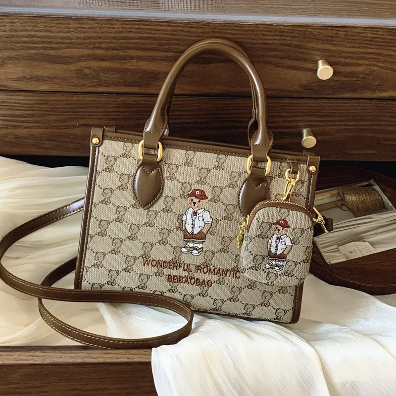 

2027 New Bag Women’s High-End Canvas Jacquard Tote with Bear Embroidery - Large Capacity, Portable Trendy for Commute Travel