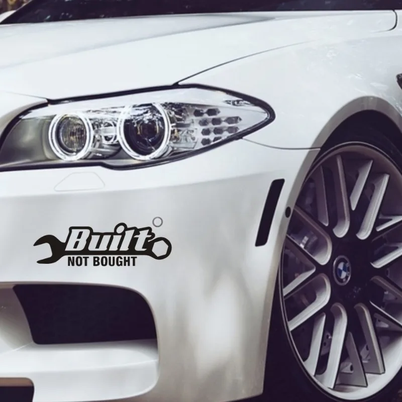 สติกเกอร์ติดรถยนต์ 1 ชิ้น ลายข้อความภาษาอังกฤษว่า “Built Not Bought” ดีไซน์รูปประแจ สำหรับตกแต่งรถยนต์ แล็ปท็อป และอุปกรณ์อื่นๆ