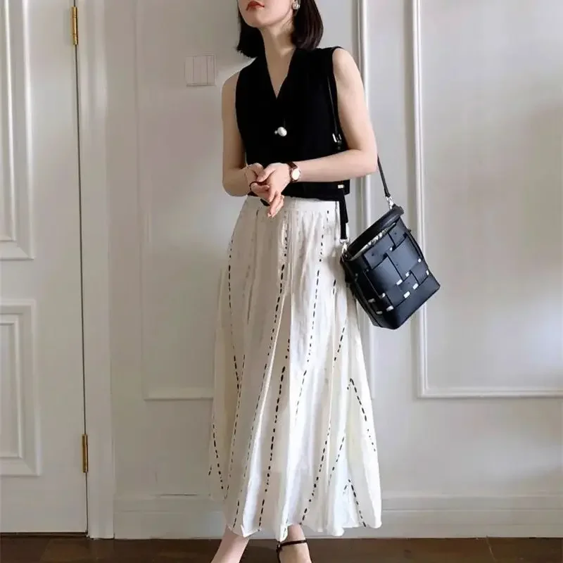 ฤดูร้อนใหม่ภาษาฝรั่งเศสคํากระโปรงผู้หญิงวินเทจแฟชั่นลายพิมพ์สูงเอว Casual หลวม A-Line Midi กระโปรง Elegant Jupe