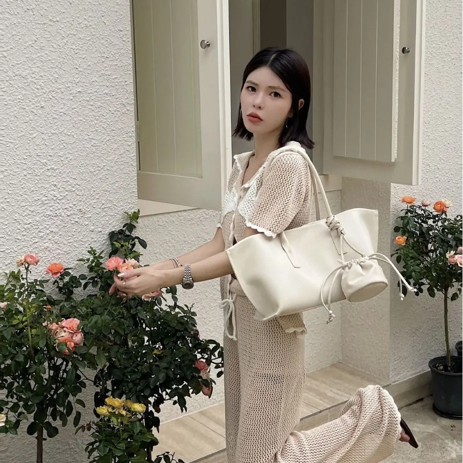 

2026 New Fashion Versatile Cowhide Gemini Minimalist Design Tote Bag Portable Personality Shoulder Underarm Bag