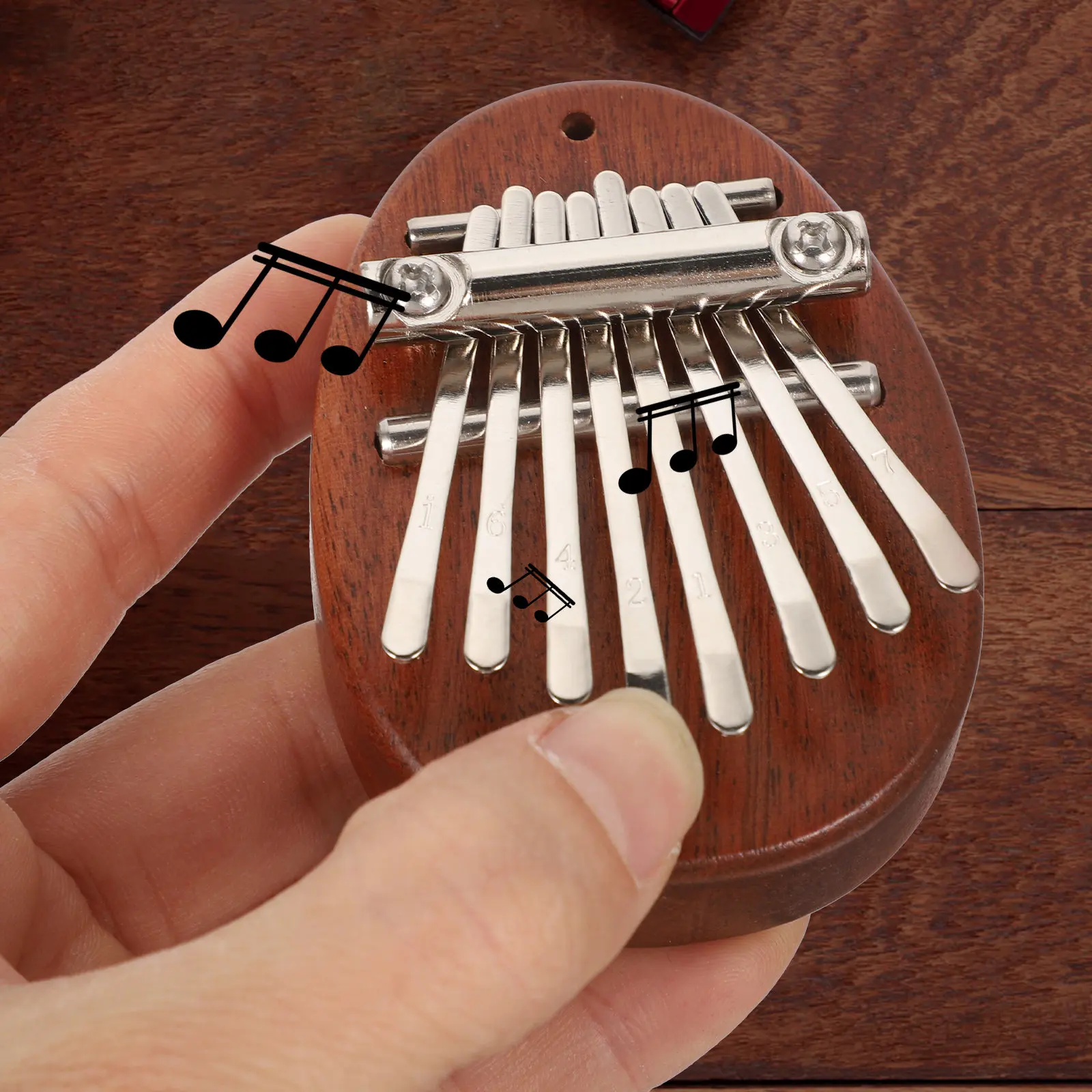A Musical Instrument With Keys - Mini Kalimba de Madera de 8