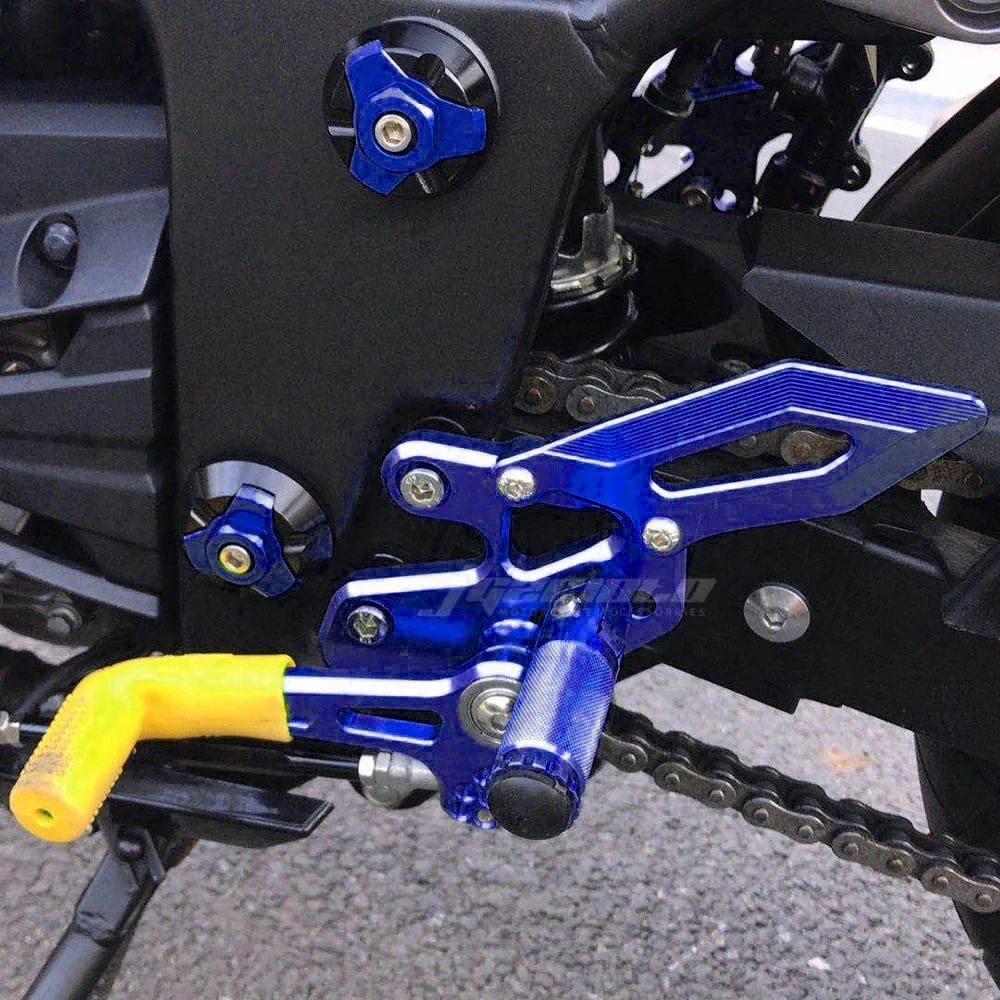 STLF زوج دراجة نارية CNC الخلفية القدم الفرامل والعتاد خطوة رفع الظهر دواسة الجمعية قوس ل أجزاء النينجا 300