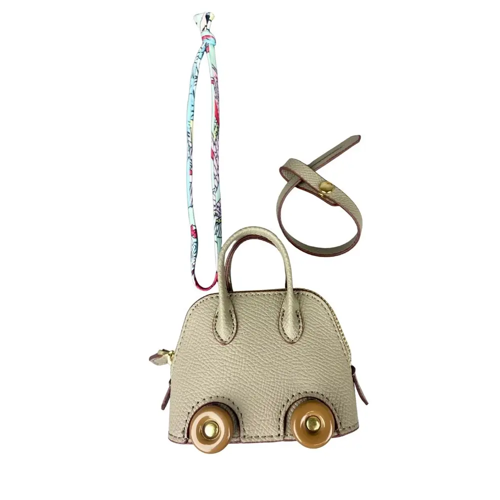 Mini-Taschenanhänger aus Leder mit niedlichen Rädern – Kopfhörer- und Lippenstiftbeutel mit zwei Riemen – PU-Leder – ideal für Taschenzubehör – Detail 9