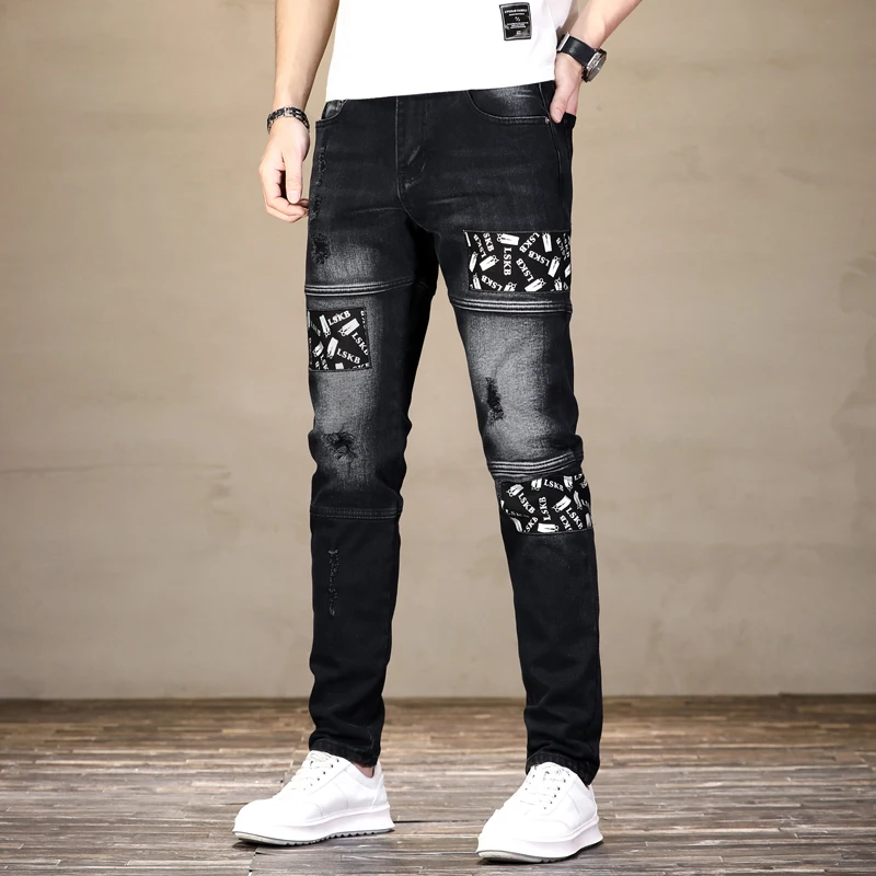 Jeans preto de costura high-end masculino, rua alta americana, remendo impresso rasgado, calças de lápis stretch finas, calças