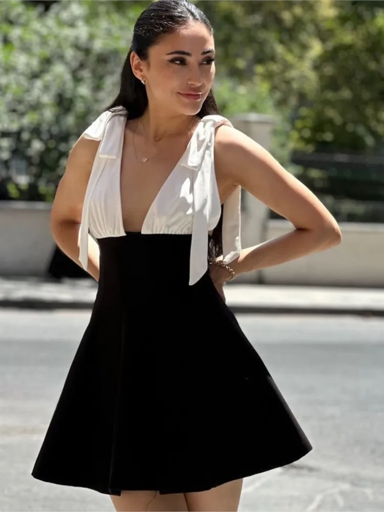 

2025 Mini dress Temperament Vestidos Elegant Dresses 2025 Woman Spaghetti Strap Simple Style French Backless Contrast Bowknot
