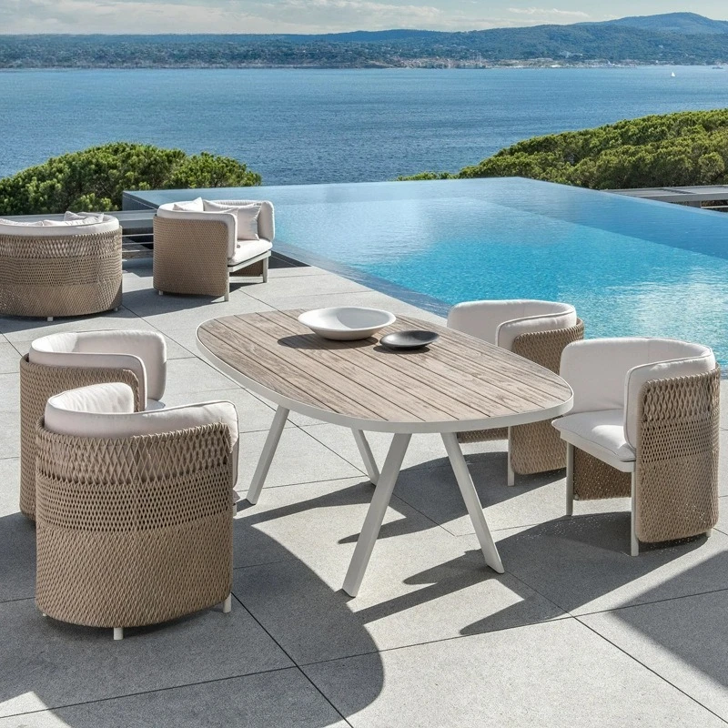 Outdoor rattan sofa villa courtyard sofa coffee table combination leisure open-air bed and breakfast hotel coffee table rattan