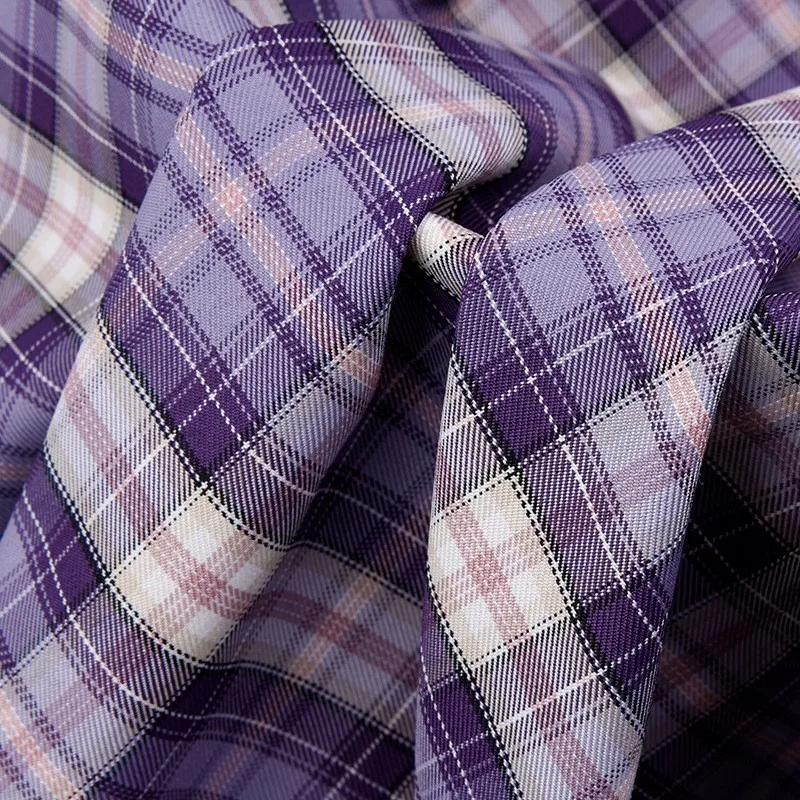 The uniform fabric is all-polyester dyed woven suitable for student uniforms and pleated skirt