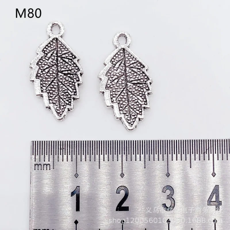 Factory Direct Sales 100Pieces DIYZinc Ornament Plant Leaves Feather Pendant 23*12MM Clothing Bags and Gifts